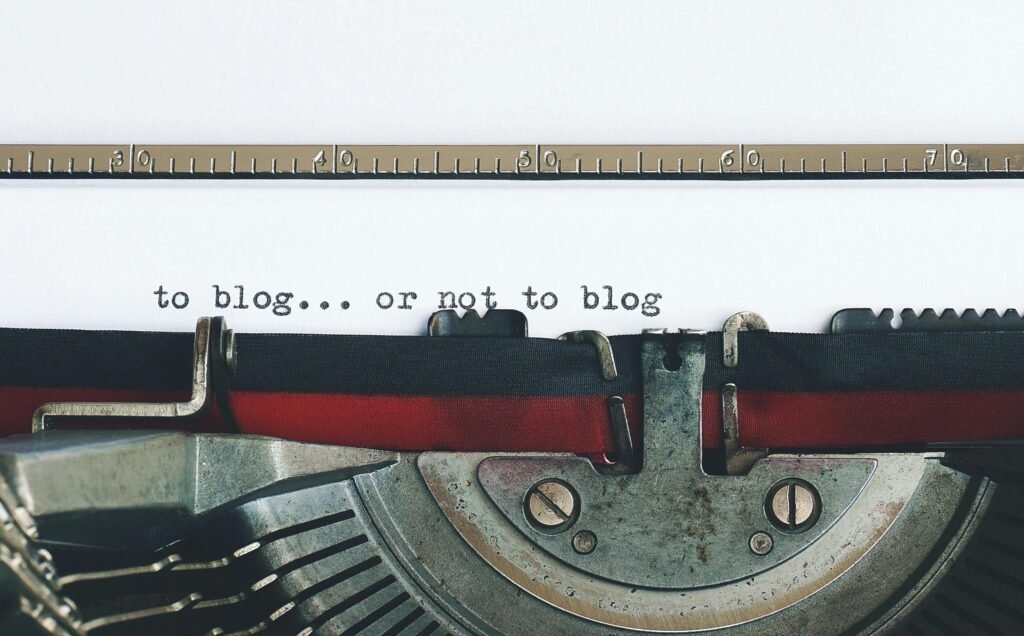 pexels-photo-3601081-3601081 Classic typewriter with 'to blog or not to blog' typed on paper.